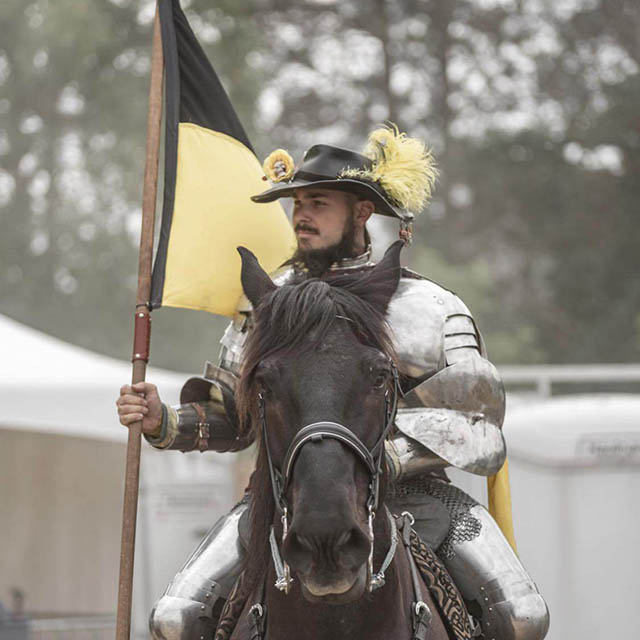 Sir Garr smiles for the crowd as he waits at the Michigan Renaissance Festival