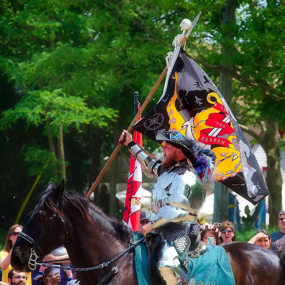 Sir Shiloh encourages the crowds cheers at the Michigan Renaissance Festival.